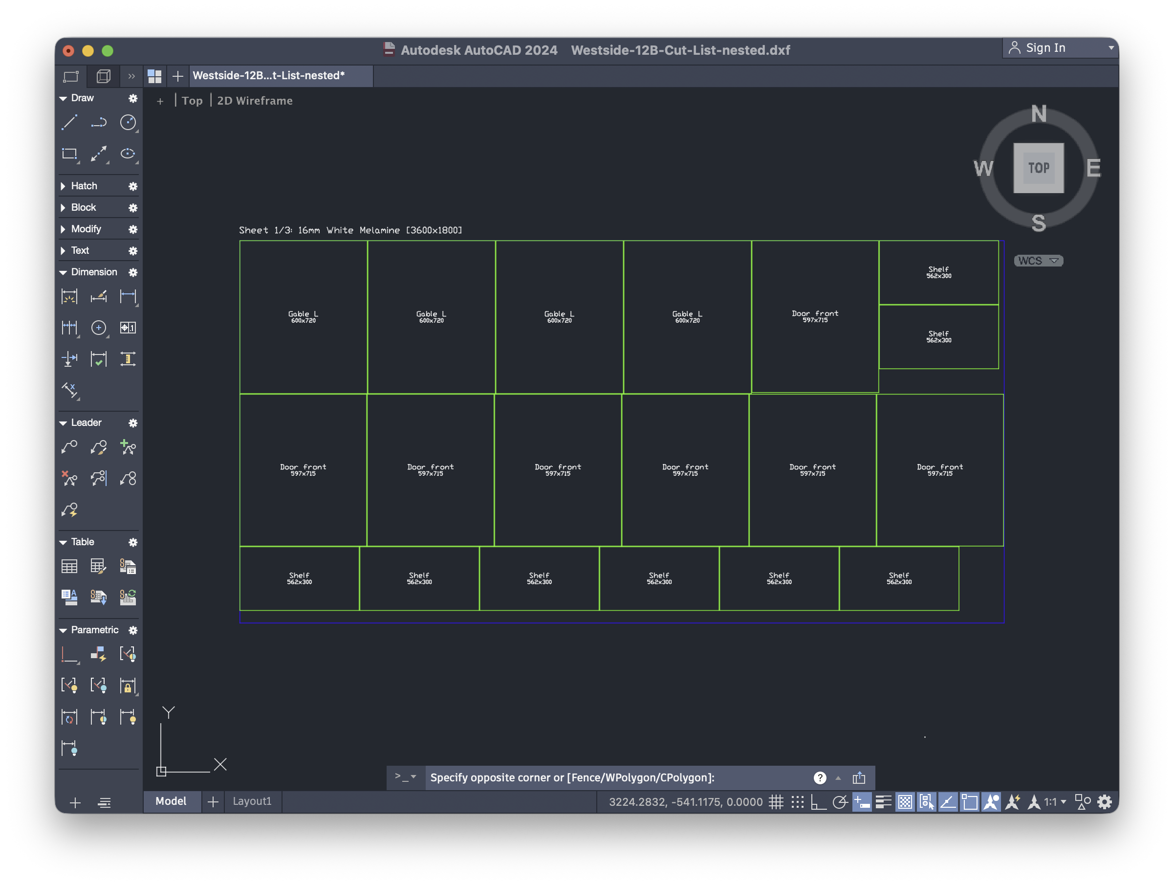 Nested DXF cut list opened in AutoCAD, showing labelled cabinet panels across a sheet of melamine